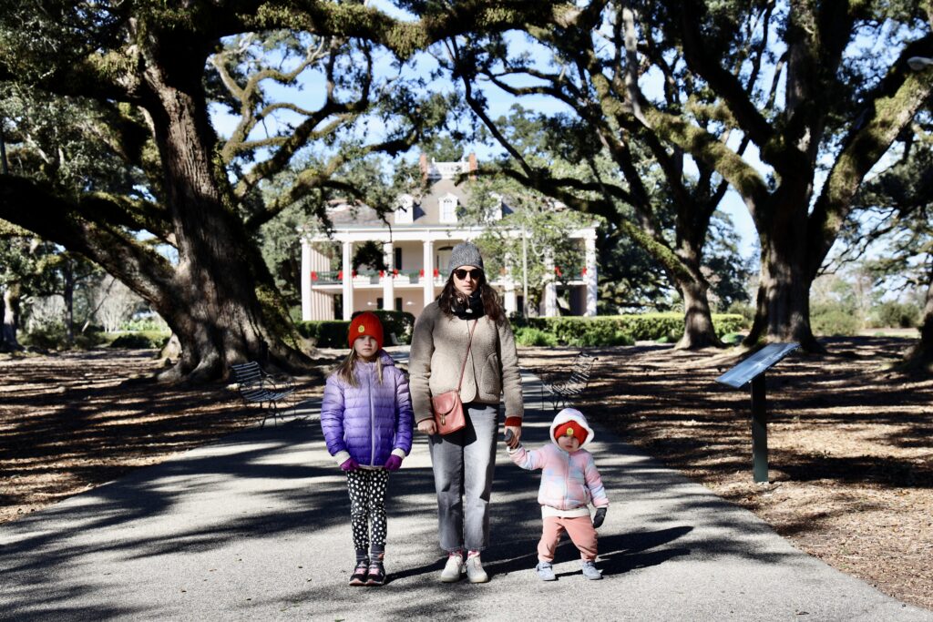 Irina, Sophia, and Zoe at Oak Alley Plantation with the Big House in the background